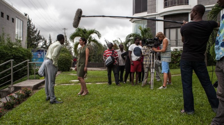 TO GO WITH AFP STORY BY FLORIAN PLAUCHEUR
Nigerian actor Wole Ojo and Moroccan actress Fatym Layachi play during the shooting of the movie "The CEO" on September 14, 2015 in Lagos. With a budget of more than USD 1 million (880,000 euros) and with a pan African casting, "The CEO" is a far cry from the shoestring productions that characterise the bulk of Nollywood's output. AFP PHOTO / FLORIAN PLAUCHEUR (Photo credit should read FLORIAN PLAUCHEUR/AFP/Getty Images)